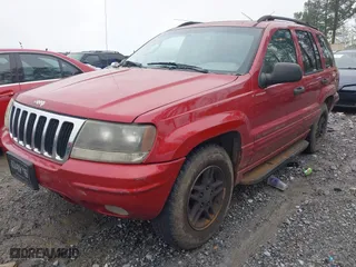 2002 Jeep Grand Cherokee Laredo with VIN 1J4GW48S22C295981, listed as a IAAI auction lot 41987578 with 188,368 mi miles. Bid and sale history available at carsss.com. Image 2.