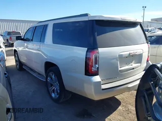 2015 GMC Yukon XL SLT with VIN 1GKS2HKC0FR179223, listed as a IAAI auction lot 40964120 with 184,592 mi miles. Bid and sale history available at carsss.com. Image 3.