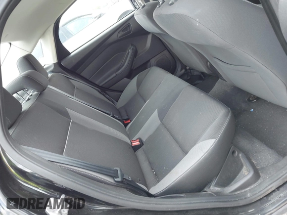 2012 Ford Focus SE z VIN 1FAHP3F26CL157551, wystawiony jako IAAI lot #42697232 z przebiegiem 135 024 mil mil oraz . Historia ofert i sprzedaży dostępna na DreamBid. Obrazek 8.