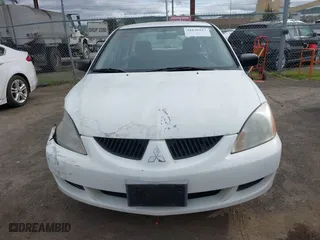 2004 Mitsubishi Lancer ES with VIN JA3AJ26E74U060371, listed as a IAAI auction lot 41636927 with 165,456 mi miles. Bid and sale history available at carsss.com. Image 12.