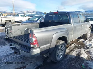 2013 Toyota Tacoma with VIN 3TMMU4FNXDM059768, listed as a IAAI auction lot 41375737 with 227,477 mi miles. Bid and sale history available at carsss.com. Image 4.