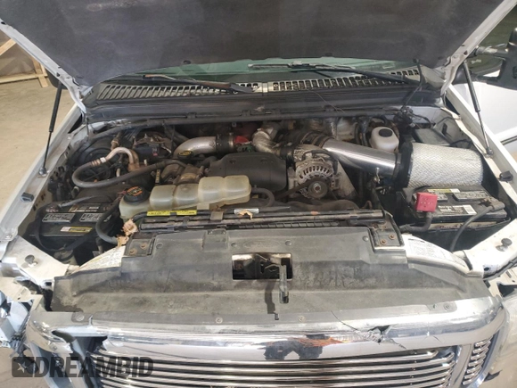 2000 Ford F-250 XL z VIN 1FTNX21F9YEC09140, wystawiony jako Copart lot #51288465 z przebiegiem 168 388 mil mil oraz Szkoda całkowita • Salvage title. Historia ofert i sprzedaży dostępna na DreamBid. Obrazek 11.