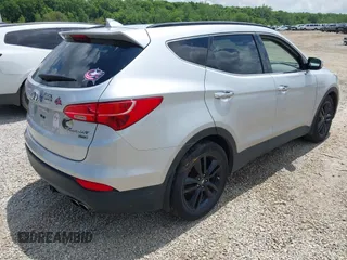 2013 Hyundai Santa Fe Sport z VIN 5XYZUDLA8DG055576, wystawiony jako IAAI lot #42392636 z przebiegiem 165 096 mil mil oraz . Historia ofert i sprzedaży dostępna na DreamBid. Obrazek 4.