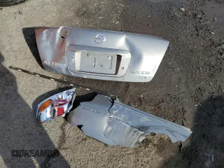 2003 Nissan Altima SE z VIN 1N4BL11E13C175155, wystawiony jako Copart lot #51336565 z przebiegiem 235 454 mil mil oraz Szkoda całkowita • Salvage title. Historia ofert i sprzedaży dostępna na DreamBid. Obrazek 12.