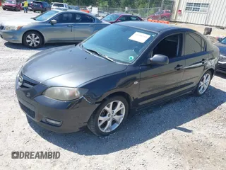 2007 Mazda 3 s Touring with VIN JM1BK323571631973, listed as a IAAI auction lot 41990310 with 287,946 mi miles. Bid and sale history available at carsss.com. Image 2.