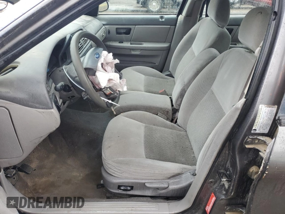 2005 Ford Taurus SE with VIN 1FAFP53U35A138592, listed as a Copart auction lot 56176905 with Not provided miles and Salvage title. Bid and sale history available at DreamBid. Image 7.