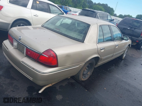 1999 Mercury Grand Marquis GS z VIN 2MEFM74W4XX645430, wystawiony jako IAAI lot #42154522 z przebiegiem 152 306 mil mil oraz . Historia ofert i sprzedaży dostępna na DreamBid. Obrazek 4.