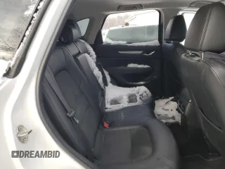 2020 Mazda CX-5 Touring z VIN JM3KFBCM4L0809644, wystawiony jako Copart lot #45048825 z przebiegiem 129 178 mil mil oraz Szkoda całkowita • Salvage title. Historia ofert i sprzedaży dostępna na DreamBid. Obrazek 11.