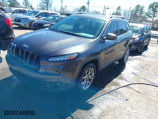 2017 Jeep Cherokee Latitude with VIN 1C4PJLCB7HW662967, listed as a IAAI auction lot 41693743 with 141,413 mi miles. Bid and sale history available at carsss.com. Image 17.