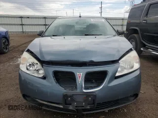 2005 Pontiac G6 GT z VIN 1G2ZH528654165958, wystawiony jako Copart lot #54258035 z przebiegiem 130 806 mil mil oraz Szkoda całkowita • Salvage title. Historia ofert i sprzedaży dostępna na DreamBid. Obrazek 5.