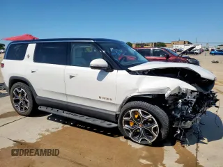 2023 Rivian R1S Launch Edition z VIN 7PDSGABL9PN010792, wystawiony jako Copart lot #56359465 z przebiegiem 24 319 mil mil oraz Szkoda całkowita • Salvage title. Historia ofert i sprzedaży dostępna na DreamBid. Obrazek 4.