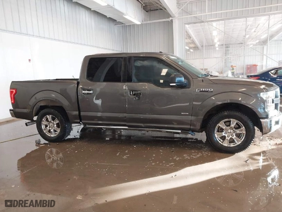 2015 Ford F-150 XL with VIN 1FTEW1CG2FKE36882, listed as a IAAI auction lot 41364096 with 143,167 mi miles. Bid and sale history available at carsss.com. Image 13.