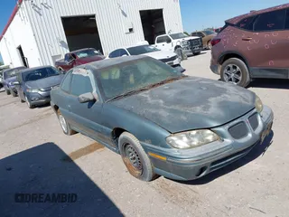 1997 Pontiac Grand Am z VIN 1G2NE12M3VC839583, wystawiony jako IAAI lot #40435683 z przebiegiem 139 953 mil mil oraz . Historia ofert i sprzedaży dostępna na DreamBid. Obrazek 1.