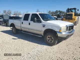 2002 Ford F-350 XL with VIN 1FTSW31S02EB34277, listed as a Copart auction lot 42691765 with 151,026 mi miles and Salvage title. Bid and sale history available at DreamBid. Image 4.