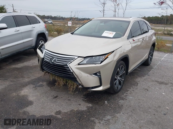 2018 Lexus RX with VIN 2T2ZZMCA9JC099803, listed as a IAAI auction lot 41052078 with 32,423 mi miles. Bid and sale history available at carsss.com. Image 17.