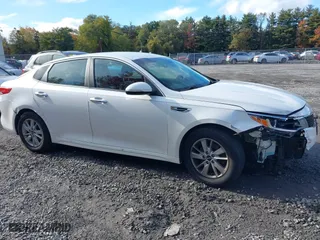 2016 Kia Optima LX with VIN KNAGT4L39G5098281, listed as a IAAI auction lot 40614976 with 99,914 mi miles. Bid and sale history available at carsss.com. Image 13.