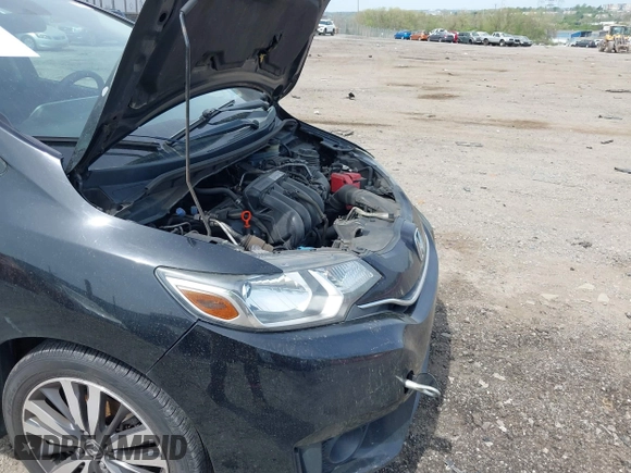 2015 Honda Fit EX-L with VIN 3HGGK5H80FM701502, listed as a IAAI auction lot 42130607 with Not Provided miles and . Bid and sale history available at DreamBid. Image 18.