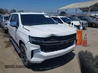 2023 Chevrolet Suburban Premier z VIN 1GNSKFKD6PR294748, wystawiony jako IAAI lot #42402000 z przebiegiem 44 783 mil mil oraz . Historia ofert i sprzedaży dostępna na DreamBid. Obrazek 1.