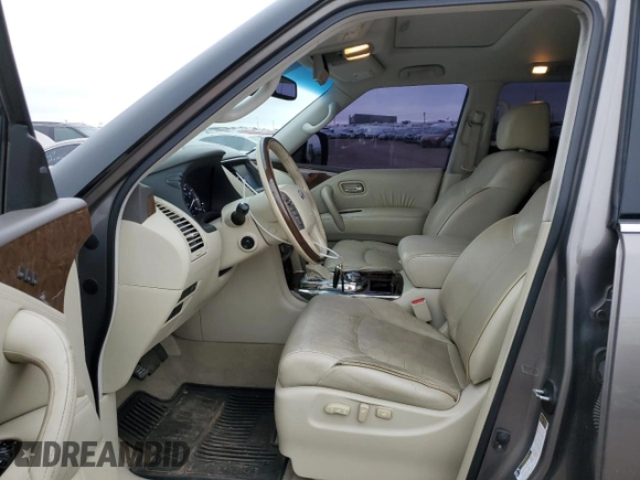 2015 Infiniti QX80 with VIN JN8AZ2NC7F9370623, listed as a Copart auction lot 66523254 with 140,653 mi miles and Salvage Title. Bid and sale history available at carsss.com. Image 7.