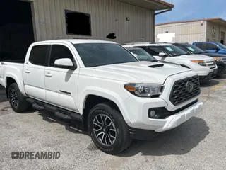 2021 Toyota Tacoma SR5 with VIN 3TYAZ5CN9MT003601, listed as a Copart auction lot 64305625 with 48,304 mi miles and Clean title. Bid and sale history available at DreamBid. Image 1.