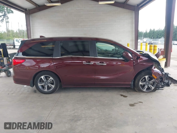 2019 Honda Odyssey Touring z VIN 5FNRL6H88KB030847, wystawiony jako IAAI lot #42433312 z przebiegiem Nie podano mil oraz . Historia ofert i sprzedaży dostępna na DreamBid. Obrazek 12.