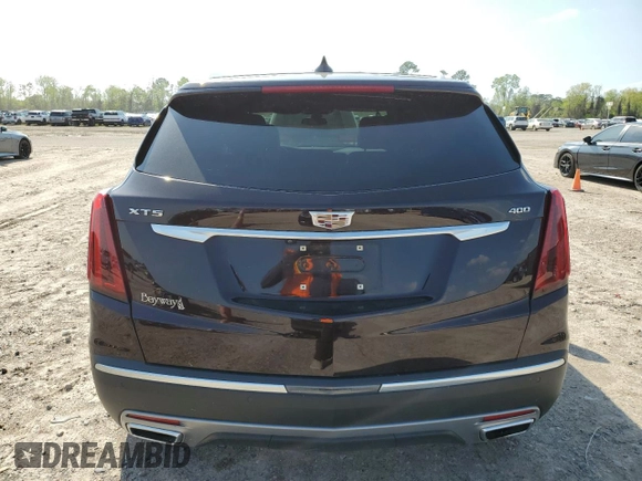2021 Cadillac XT5 FWD Premium Luxury with VIN 1GYKNCRS2MZ180884, listed as a Copart auction lot 50433445 with 27,246 mi miles and Salvage Title. Bid and sale history available at carsss.com. Image 6.