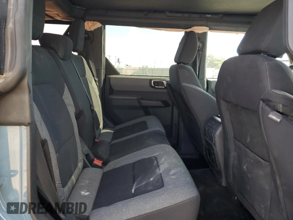 2021 Ford Bronco z VIN 1FMDE5BH4MLA84116, wystawiony jako Copart lot #57151535 z przebiegiem 22 300 mil mil oraz Szkoda całkowita • Salvage title. Historia ofert i sprzedaży dostępna na DreamBid. Obrazek 11.