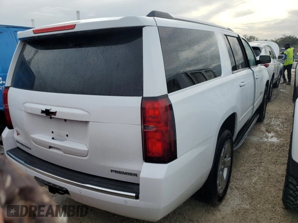 2019 Chevrolet Suburban Premier with VIN 1GNSKJKCXKR154480, listed as a Copart auction lot 77226834 with 24,683 mi miles and Non Repairable. Bid and sale history available at DreamBid. Image 3.