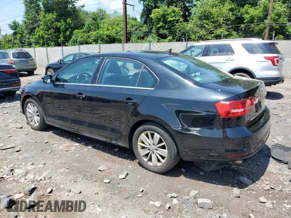 2015 Volkswagen Jetta SE with VIN 3VWD17AJ4FM329172, listed as a Copart auction lot 64143375 with 102,634 mi miles and Clean title. Bid and sale history available at DreamBid. Image 2.