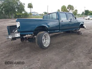 1997 Ford F-350 with VIN 1FTJW36F0VEC88290, listed as a IAAI auction lot 42594477 with 230,353 mi miles and . Bid and sale history available at DreamBid. Image 4.