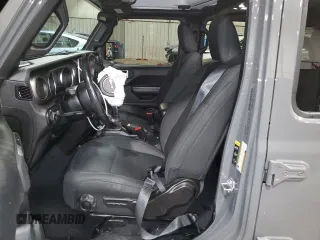 2020 Jeep Wrangler Unlimited Willys with VIN 1C4HJXDG3LW166868, listed as a Copart auction lot 84815154 with 66,640 mi miles and Salvage title. Bid and sale history available at DreamBid. Image 7.