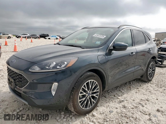 2022 Ford Escape SEL Plug-In Hybrid z VIN 1FMCU0KZ9NUB95198, wystawiony jako Copart lot #61973725 z przebiegiem 15 502 mil mil oraz Szkoda całkowita • Salvage title. Historia ofert i sprzedaży dostępna na DreamBid. Obrazek 1.