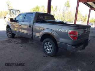 2011 Ford F-150 XL with VIN 1FTFW1EFXBKD24723, listed as a IAAI auction lot 42125305 with 202,032 mi miles. Bid and sale history available at carsss.com. Image 3.