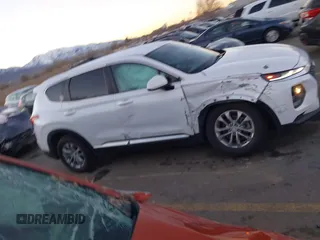 2019 Hyundai Santa Fe SE z VIN 5NMS23AD9KH077362, wystawiony jako IAAI lot #41890584 z przebiegiem 132 476 mil mil oraz . Historia ofert i sprzedaży dostępna na DreamBid. Obrazek 13.