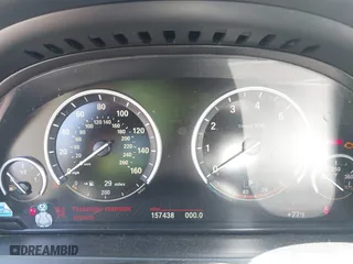 2013 BMW 7 Series 750i with VIN WBAYA8C50DD227951, listed as a IAAI auction lot 41842264 with 157,438 mi miles. Bid and sale history available at carsss.com. Image 7.