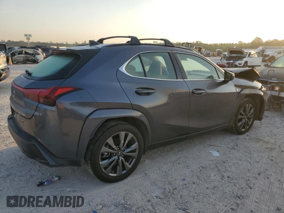 2023 Lexus UX 250h F Sport with VIN JTHR6JBH5P2151069, listed as a Copart auction lot 58382515 with 23,114 mi miles and Salvage title. Bid and sale history available at DreamBid. Image 3.