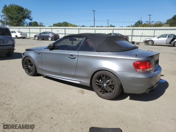 2009 BMW 1 Series 135i with VIN WBAUN93529VK40677, listed as a Copart auction lot 76190644 with 126,992 mi miles and Salvage Title. Bid and sale history available at carsss.com. Image 2.