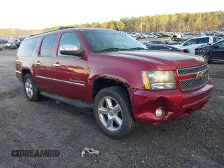 2009 Chevrolet Suburban LTZ with VIN 1GNFK36359R220094, listed as a IAAI auction lot 41858436 with 247,913 mi miles. Bid and sale history available at carsss.com. Image 1.