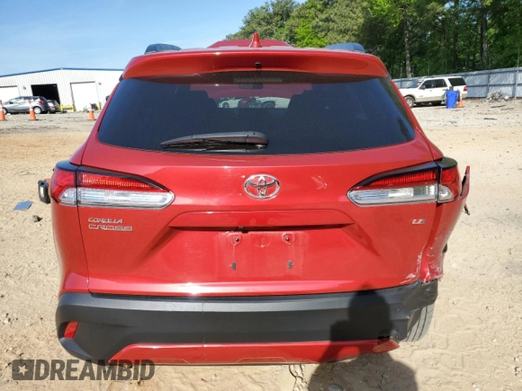 2023 Toyota Corolla Cross LE with VIN 7MUCAAAG9PV068256, listed as a Copart auction lot 53640845 with 49,989 mi miles and Salvage title. Bid and sale history available at DreamBid. Image 6.