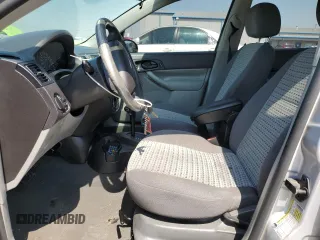 2007 Ford Focus S with VIN 1FAHP34N77W364581, listed as a Copart auction lot 52179835 with 111,701 mi miles and Salvage Title. Bid and sale history available at carsss.com. Image 7.