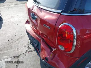 2015 MINI Countryman z VIN WMWZB3C51FWR44130, wystawiony jako IAAI lot #42218448 z przebiegiem 148 409 mil mil oraz . Historia ofert i sprzedaży dostępna na DreamBid. Obrazek 12.