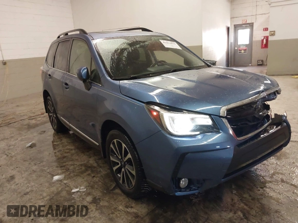 2017 Subaru Forester Touring with VIN JF2SJGTC9HH410251, listed as a IAAI auction lot 41411079 with 131,220 mi miles and . Bid and sale history available at DreamBid. Image 1.