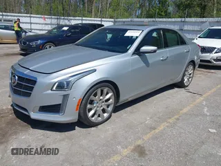 2014 Cadillac CTS Performance AWD z VIN 1G6AY5S38E0185345, wystawiony jako IAAI lot #42216924 z przebiegiem 141 654 mil mil oraz . Historia ofert i sprzedaży dostępna na DreamBid. Obrazek 2.
