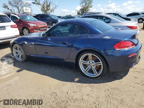 2011 BMW Z4 sDrive35is with VIN WBALM1C56BE393858, listed as a Copart auction lot 74249954 with Not provided miles and Salvage title. Bid and sale history available at DreamBid. Image 2.
