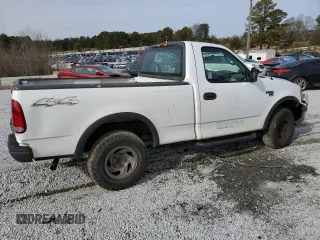 2003 Ford F-150 XL z VIN 1FTRF18W53NB45997, wystawiony jako Copart lot #42451525 z przebiegiem 149 166 mil mil oraz Szkoda całkowita • Salvage title. Historia ofert i sprzedaży dostępna na DreamBid. Obrazek 3.