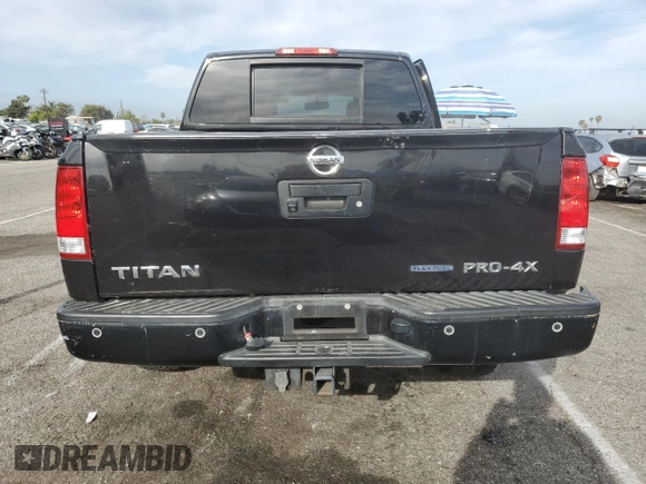 2013 Nissan Titan SL with VIN 1N6BA0EC9DN306161, listed as a Copart auction lot 50923005 with 199,141 mi miles and Salvage Title. Bid and sale history available at DreamBid. Image 6.