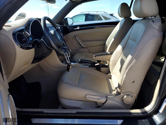 2013 Volkswagen Beetle Convertible 2.0L TDI w/Sound/Nav with VIN 3VW5L7AT0DM802756, listed as a Copart auction lot 74003414 with 58,749 mi miles and Salvage Title. Bid and sale history available at carsss.com. Image 7.