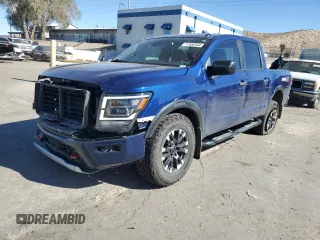 2021 Nissan Titan Pro-4X with VIN 1N6AA1ED1MN510768, listed as a Copart auction lot 77556484 with 57,540 mi miles and Salvage title. Bid and sale history available at DreamBid. Image 1.