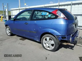 2004 Ford Focus ZX3 with VIN 3FAFP313X4R123879, listed as a Copart auction lot 54052055 with 174,692 mi miles and Salvage Title. Bid and sale history available at carsss.com. Image 2.