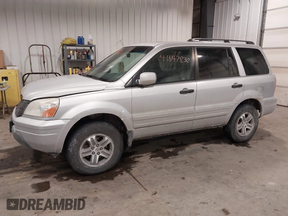 2005 Honda Pilot EX-L with VIN 2HKYF18575H557005, listed as a IAAI auction lot 41647830 with 245,992 mi miles. Bid and sale history available at carsss.com. Image 2.